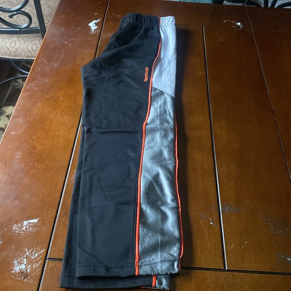 Reebok tricot pants size S (8) boys. Black white and orange/grey. - Picture 2 of 16